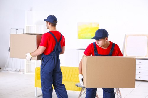 Removal van and moving boxes in a Waterloo residential street