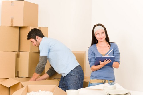Packed boxes and furniture prepared for a Waterloo apartment relocation
